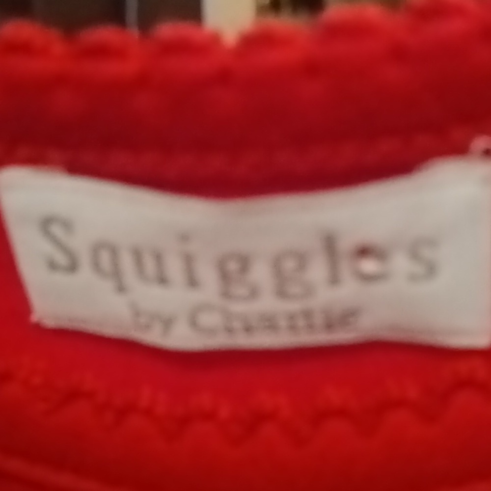 FINAL PRICE NWT Squiggles 100% red lap shoulder gown w elastic hem 0/3 mths